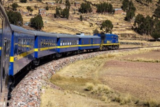A PeruRail tourist train on the line below Machu Picchu