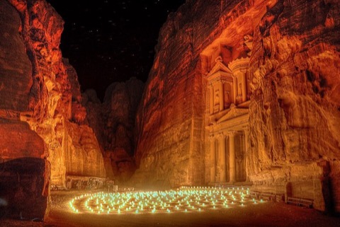 Candles lighting the Treasury facade during Petra by Night
